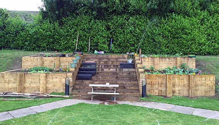 Roman Bisecting Pergola Above Ground Before Roman Bisecting Pergola Above Ground Before