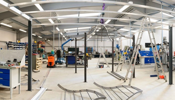 Contemporary Pergola & Shade Production in the foreground