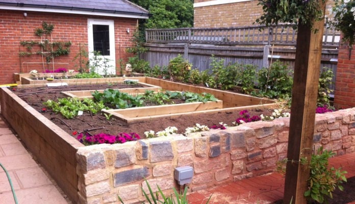 Bespoke walk in steel cage to fit an existing raised bed (before)