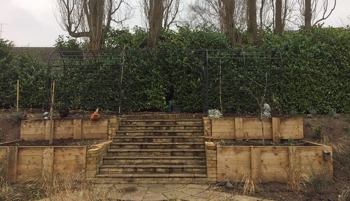 Roman Bisecting Pergola Above Ground Winter 1 Roman Bisecting Pergola Above Ground Winter 1