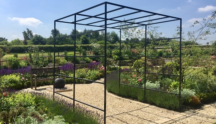 Daisy Barn Garden Square Pergola in full sun